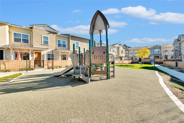 community playground featuring a residential view