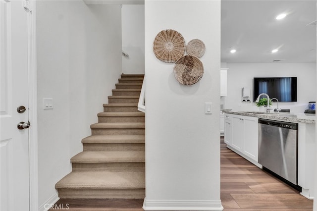 interior space with wood finished floors and recessed lighting