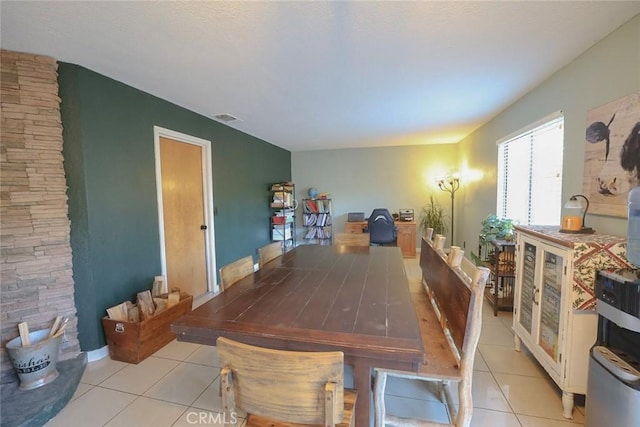 view of tiled dining space