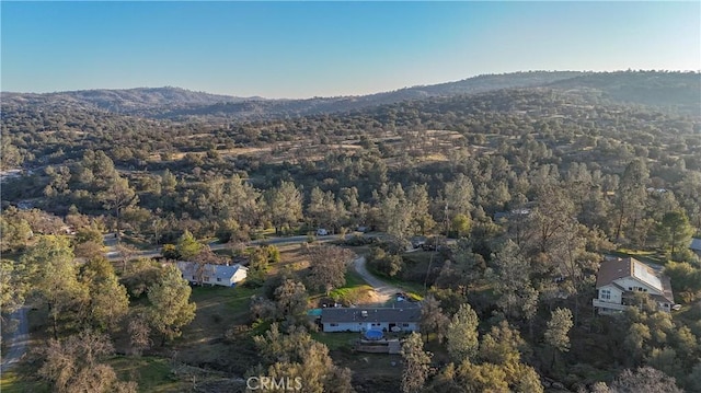 drone / aerial view featuring a mountain view