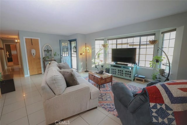 living room with tile patterned flooring