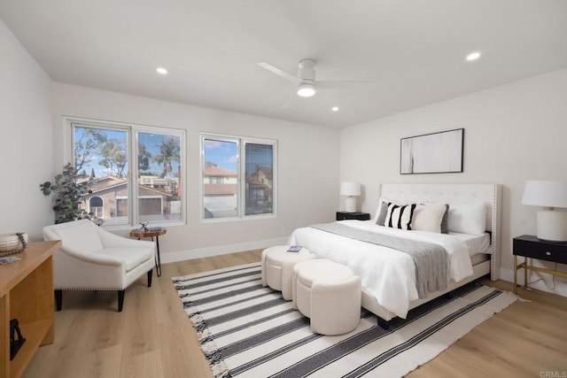 bedroom featuring ceiling fan and light wood-type flooring