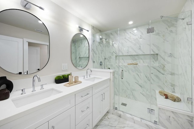 bathroom with vanity and walk in shower