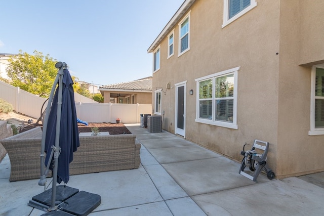 view of patio / terrace with an outdoor hangout area and cooling unit