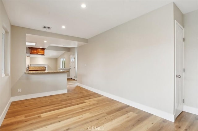 interior space with light hardwood / wood-style flooring