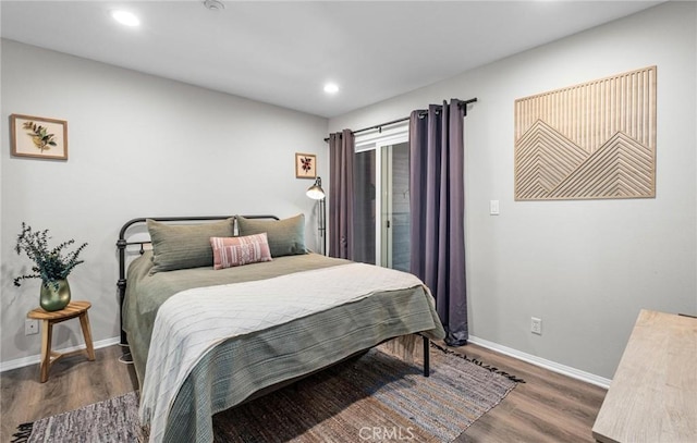 bedroom featuring dark hardwood / wood-style floors