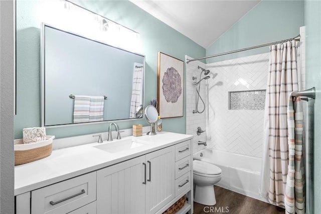 full bathroom with toilet, vaulted ceiling, shower / tub combo, vanity, and hardwood / wood-style flooring