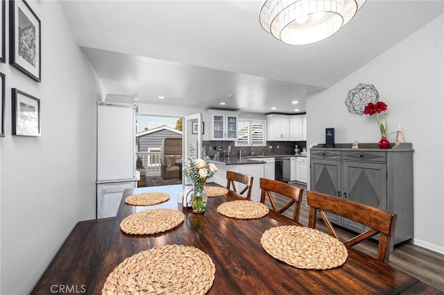 dining area featuring dark hardwood / wood-style flooring