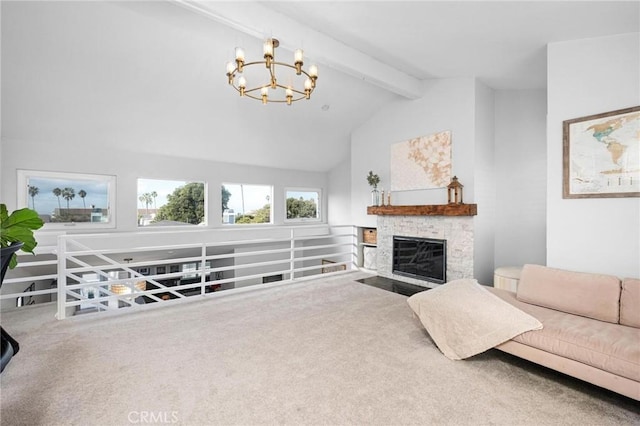 carpeted living room featuring vaulted ceiling with beams, a notable chandelier, and a fireplace