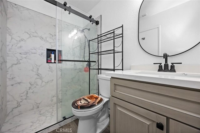 bathroom with vanity, an enclosed shower, wood-type flooring, and toilet