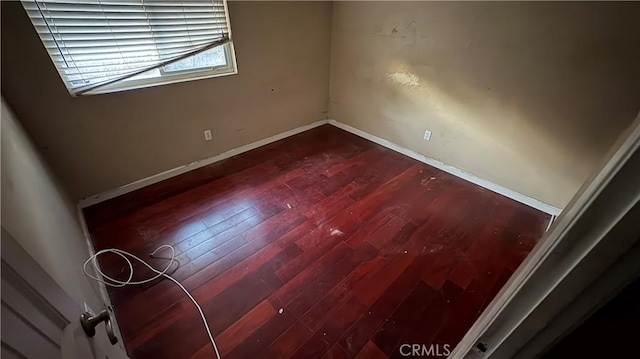 empty room featuring hardwood / wood-style floors