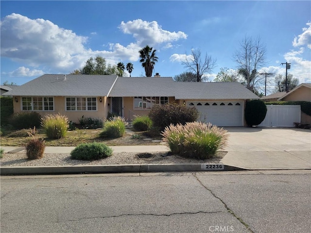 single story home with a garage