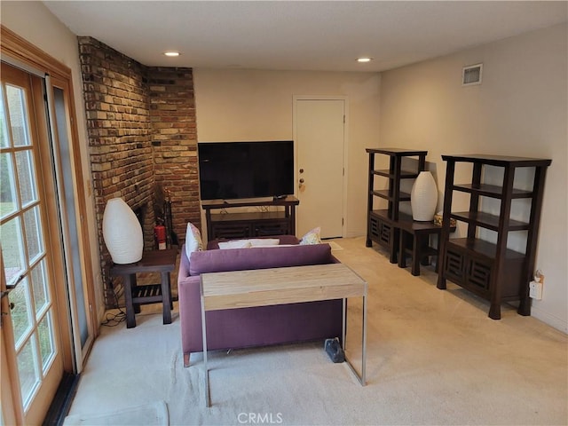 living room featuring light colored carpet