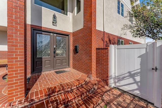 doorway to property featuring french doors