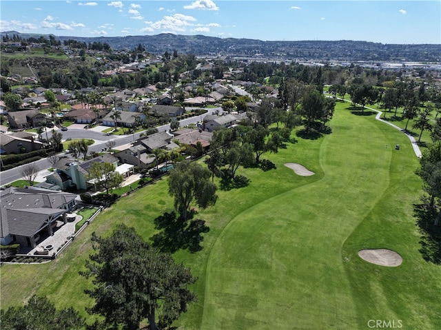 aerial view featuring a residential view and view of golf course