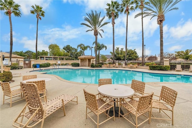 view of swimming pool featuring a patio