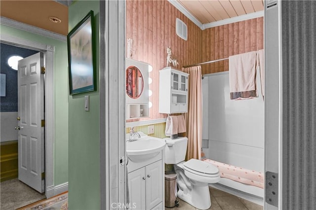 bathroom featuring tile patterned flooring, ornamental molding, vanity, toilet, and a shower with curtain