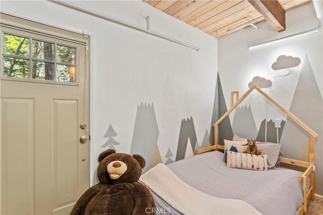 26619 Bel Air Ct, Lake Arrowhead, CA 92352 - bedroom featuring wooden ceiling with exposed beams and baseboards