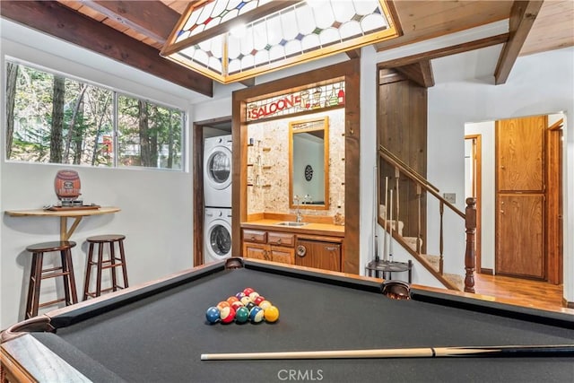 26619 Bel Air Ct, Lake Arrowhead, CA 92352 - playroom with stacked washer and clothes dryer, pool table, beam ceiling, and a sink