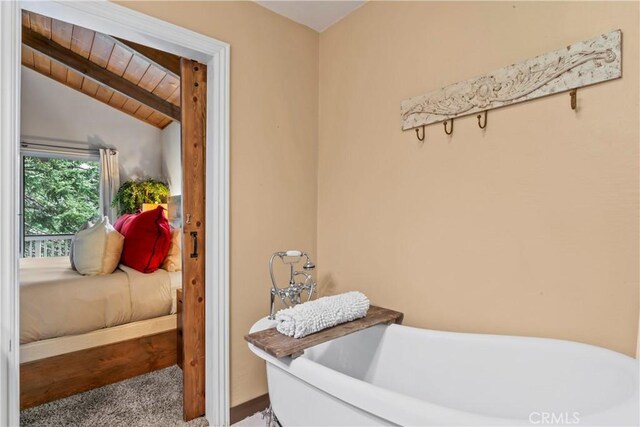 26619 Bel Air Ct, Lake Arrowhead, CA 92352 - full bathroom featuring a freestanding bath, lofted ceiling, and ensuite bath