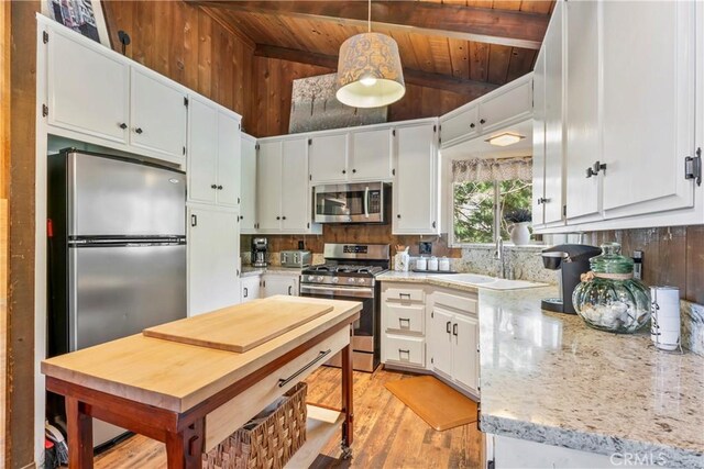 26619 Bel Air Ct, Lake Arrowhead, CA 92352 - kitchen featuring stainless steel appliances, wooden ceiling, a sink, light wood-style floors, and backsplash