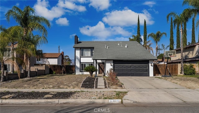 view of front of home with a garage