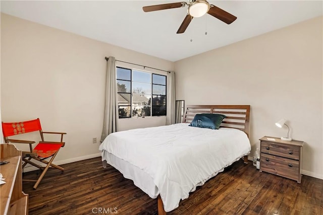 bedroom featuring ceiling fan and dark hardwood / wood-style flooring