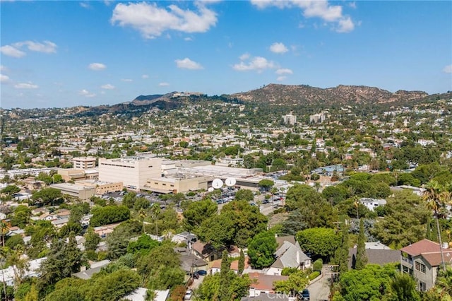 drone / aerial view featuring a mountain view