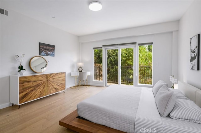 3822 Clayton Ave, Los Angeles, CA 90027 - bedroom featuring visible vents, baseboards, and wood finished floors