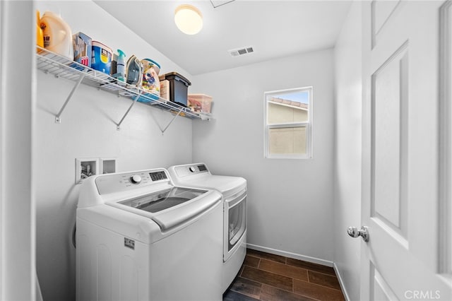 laundry area featuring independent washer and dryer