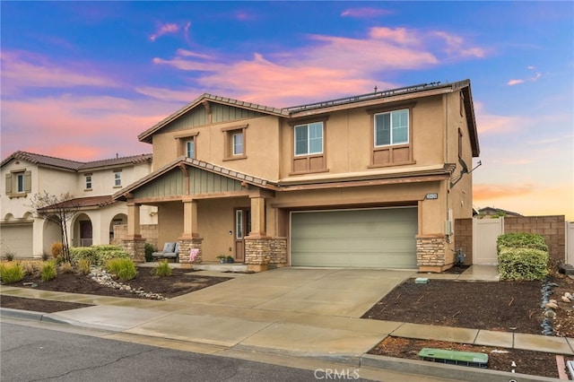 view of front of property featuring a garage