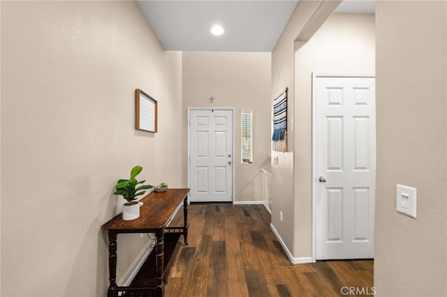 hallway featuring dark wood-type flooring