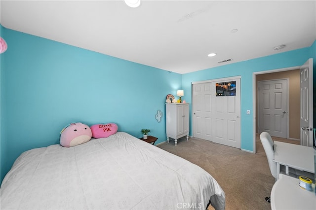 carpeted bedroom featuring a closet