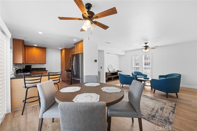 1320 W Fern Ave, Redlands, CA 92373 - dining space with light wood-style floors, a ceiling fan, and recessed lighting