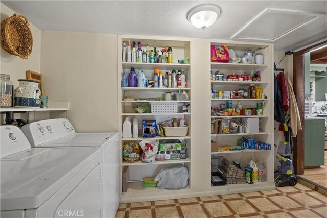 interior space with washing machine and clothes dryer