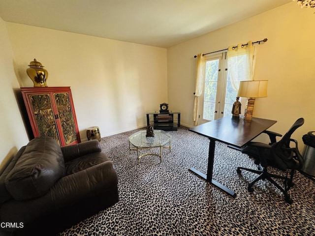 carpeted office space featuring baseboards
