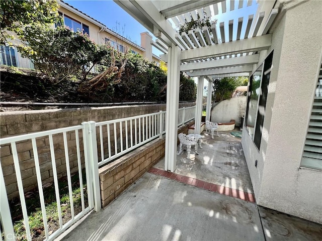 view of patio featuring a pergola