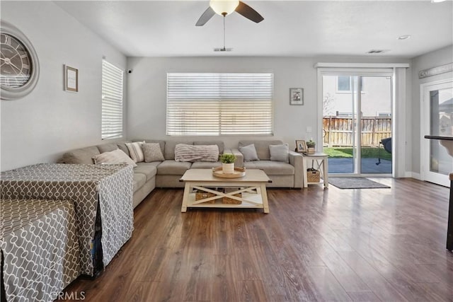 31242 Bell Mountain Rd, Menifee, CA 92584 - living area featuring ceiling fan and dark wood finished floors