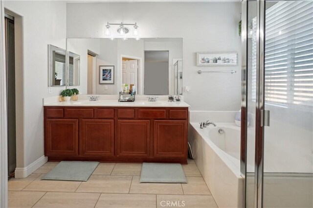 31242 Bell Mountain Rd, Menifee, CA 92584 - full bath featuring a garden tub, double vanity, and tile patterned floors