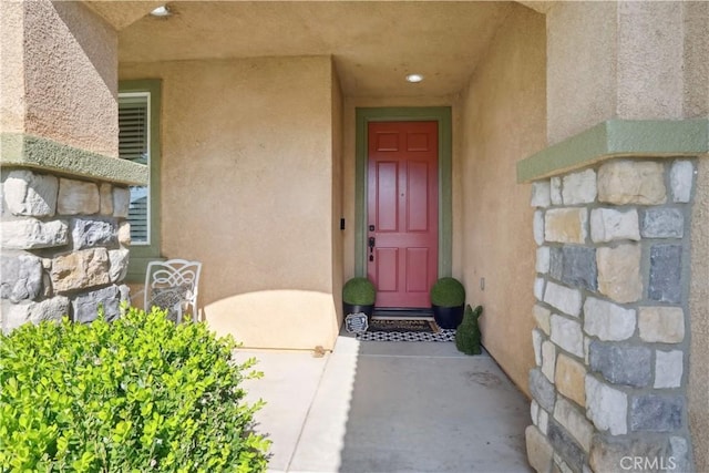 31242 Bell Mountain Rd, Menifee, CA 92584 - doorway to property featuring stucco siding and stone siding