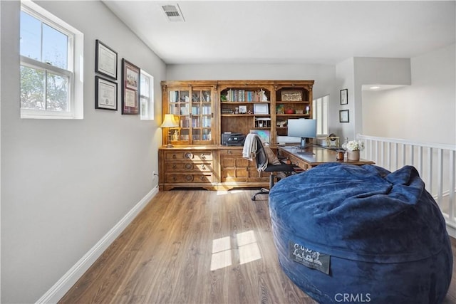 31242 Bell Mountain Rd, Menifee, CA 92584 - office area with wood finished floors and baseboards