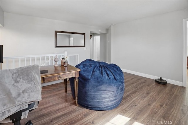 31242 Bell Mountain Rd, Menifee, CA 92584 - sitting room with wood finished floors and baseboards