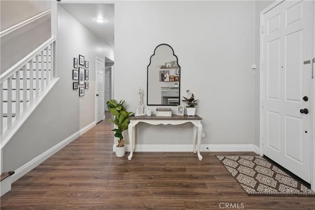 31242 Bell Mountain Rd, Menifee, CA 92584 - entrance foyer featuring wood finished floors, stairway, and baseboards