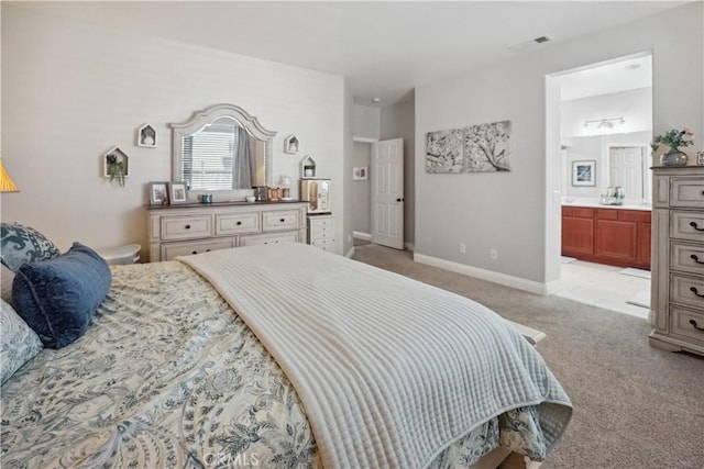 31242 Bell Mountain Rd, Menifee, CA 92584 - bedroom featuring light carpet, ensuite bathroom, and baseboards