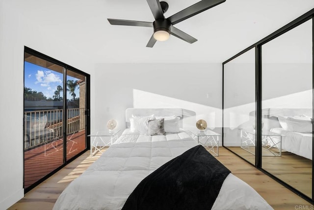 bedroom with ceiling fan, access to exterior, and light wood-type flooring