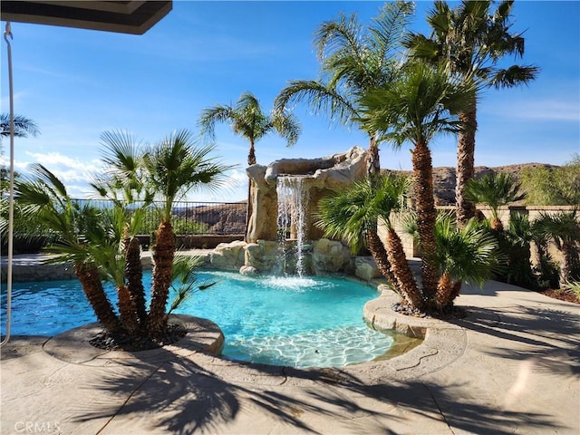 view of pool with fence and a fenced in pool