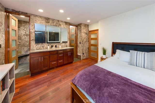 bedroom featuring dark hardwood / wood-style flooring