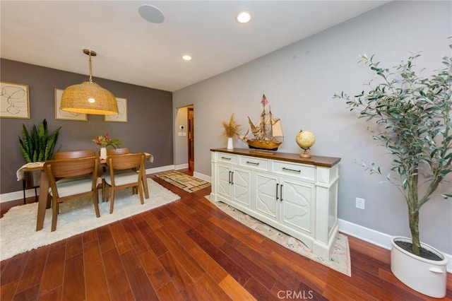 dining area featuring dark hardwood / wood-style flooring