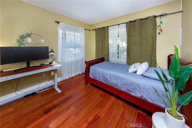 bedroom featuring hardwood / wood-style flooring