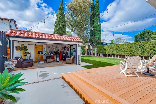 exterior space featuring a yard, a patio area, and an outdoor structure